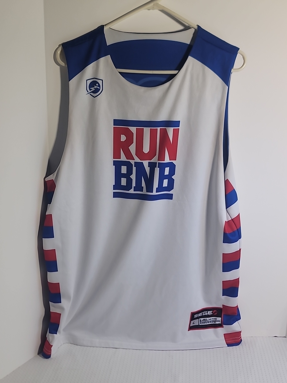 SIEGE Sports White Jersey with Red & Blue Accents